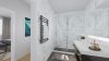 Großzügige 4-Zimmer-Wohnung mit Loggia & Blick auf die Gärten der Welt - Einrichtungsbeispiel Badezimmer